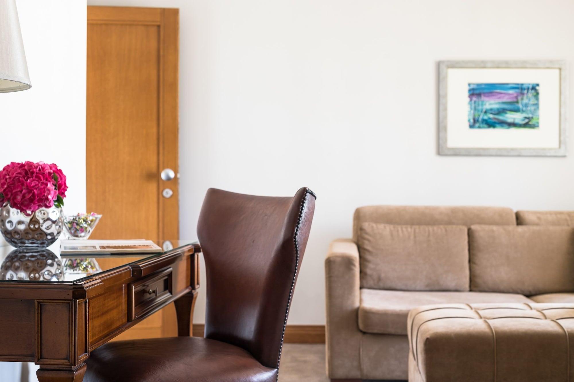 호텔 뒤 락 콩그레스 센터&스파 이오아니아 외부 사진 A living room at the hotel